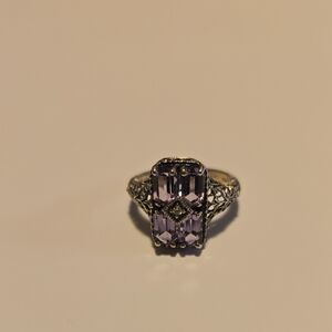 Elegant Silver and Purple Gemstone Ring